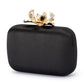 Adele Orchid Lock Clutch (Black)