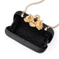 Adele Orchid Lock Clutch (Black)