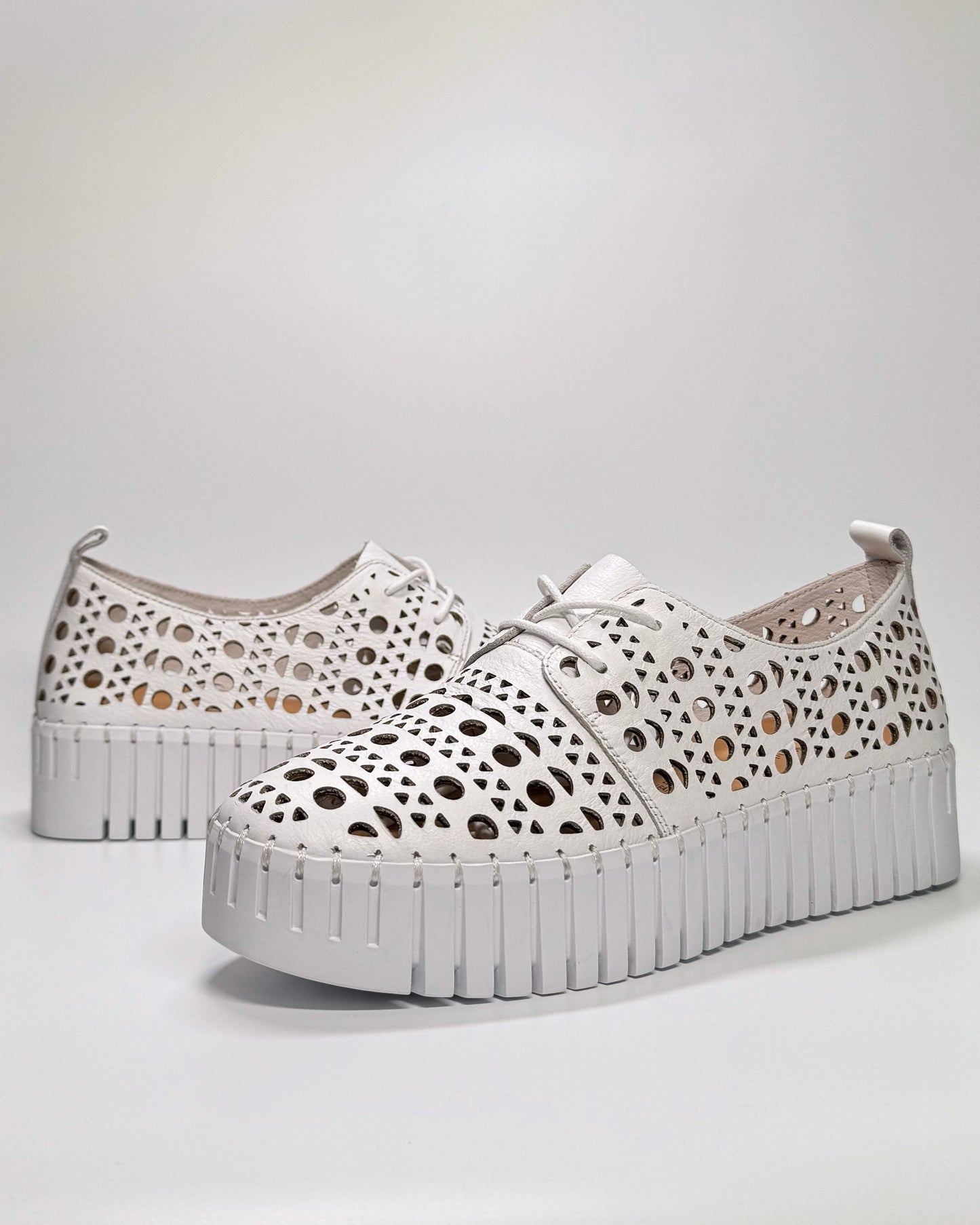 Women's Laser Cut White Sneaker | Gretel Lane