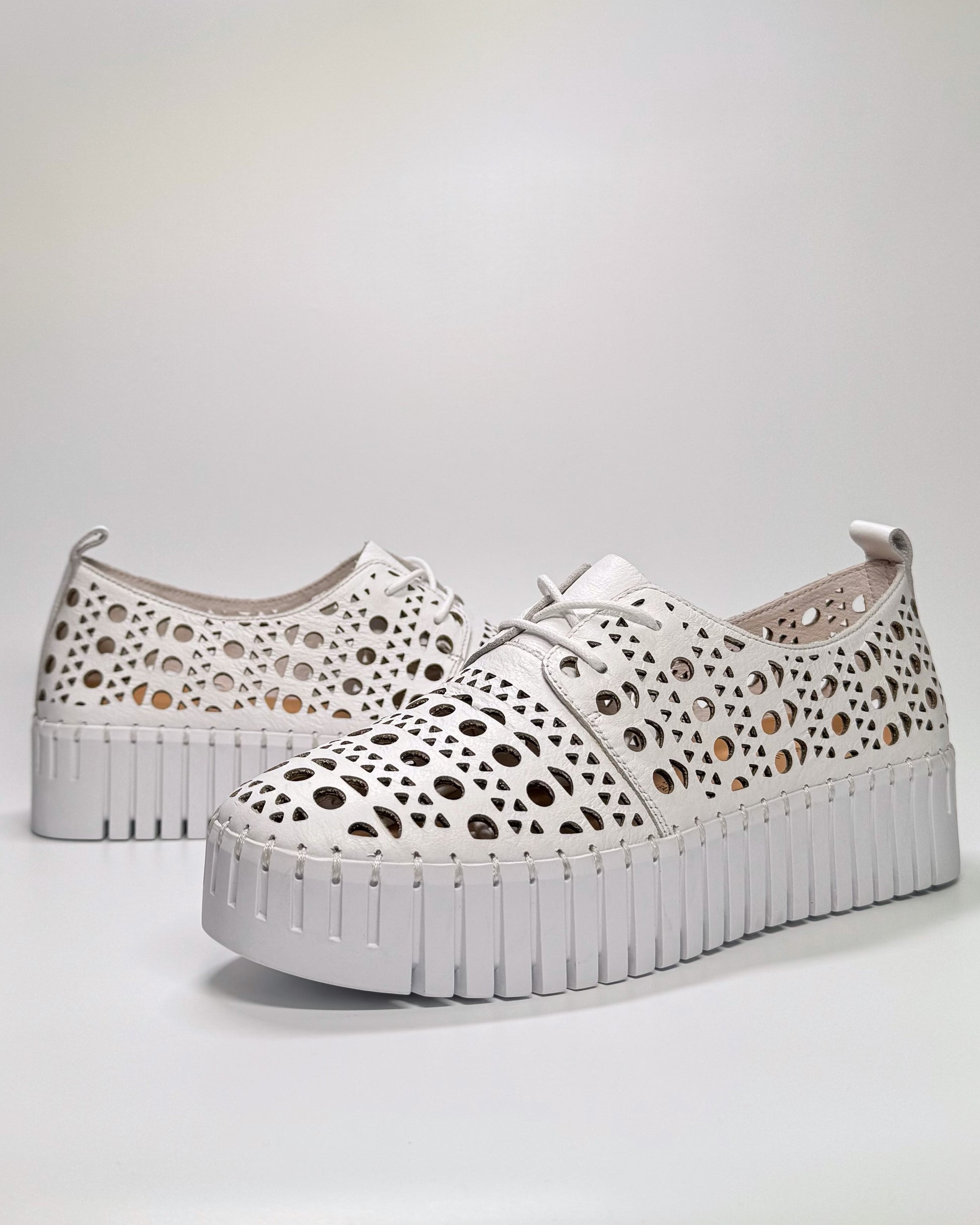 Women's Laser Cut White Sneaker | Gretel Lane
