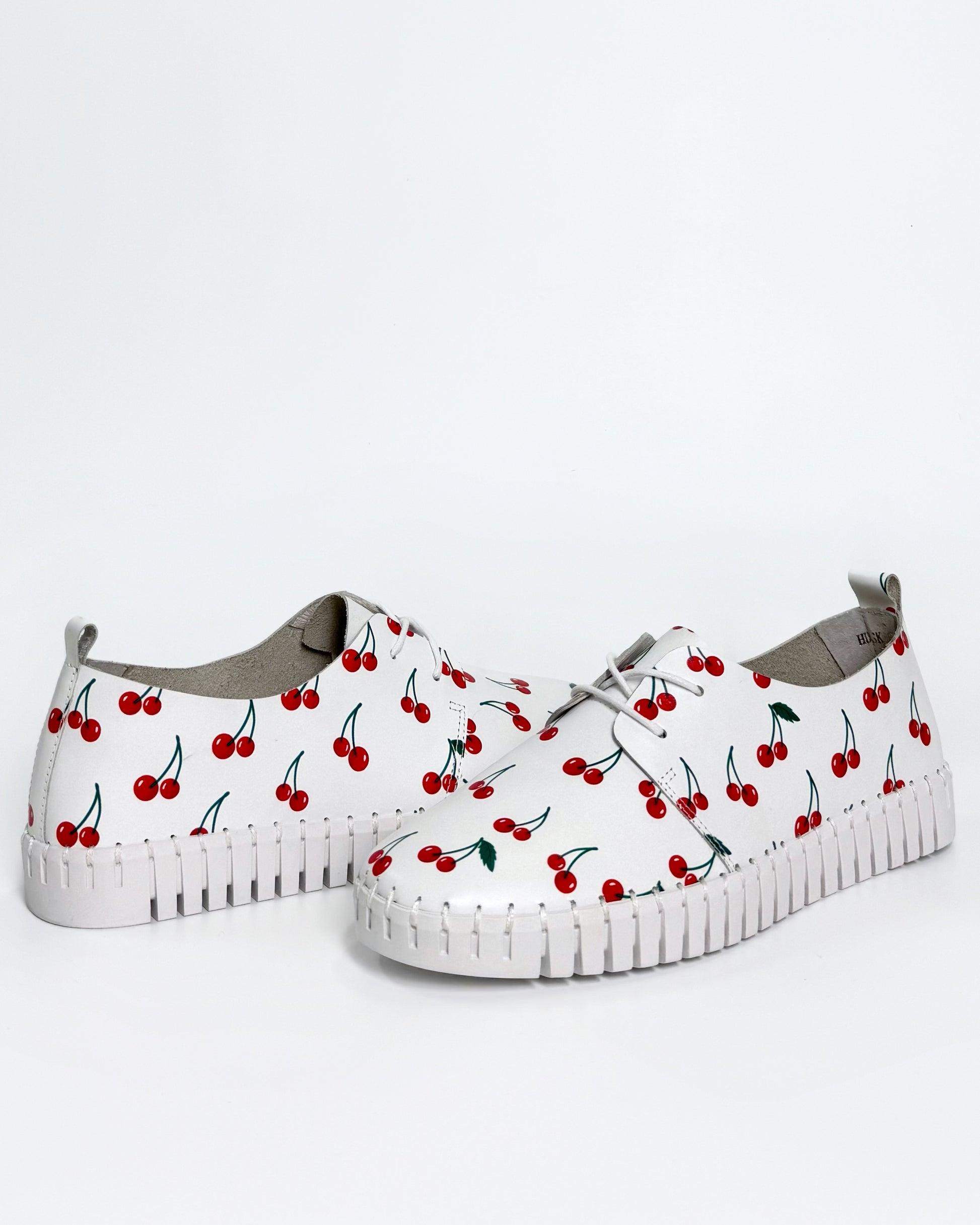 Women's white sneaker with cherry print | Gretel Lane