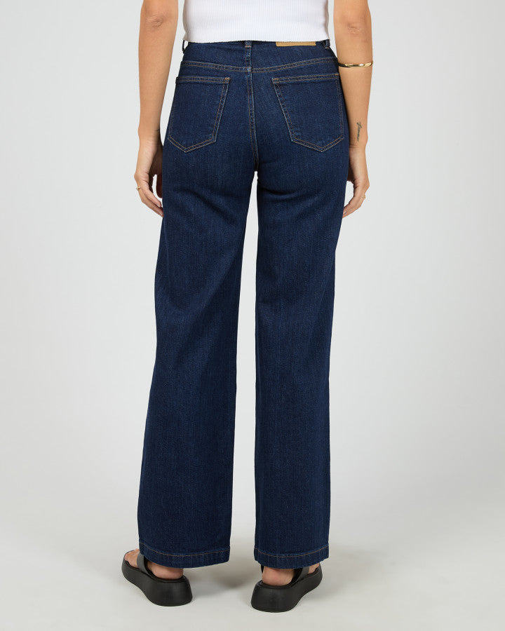 Dark indigo denim jeans with full-length fit | All About Eve